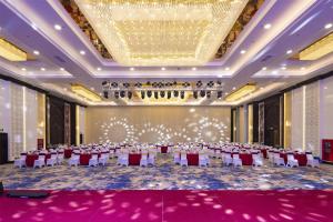 a large banquet hall with tables and chairs at Imperial Dalat Hotel, BW Premier Collection in Da Lat +139 photos
