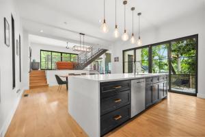 a kitchen with a large island in the middle at Music Soul House in Atlanta
