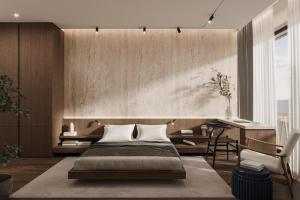 a bedroom with a bed and a desk at Gradska Palača - BOSANA Hotel & Spa in Bihać