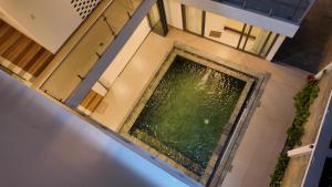 an overhead view of a swimming pool in a building at Zenna villa long Hải in Bà Rịa