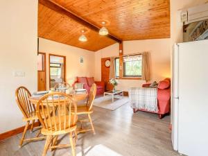 a kitchen and dining room with a table and chairs at 2 Bed in Pencader oc-89500 in Pencader