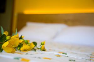 Postel nebo postele na pokoji v ubytování Bellafiora Affittacamere