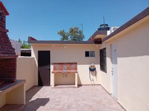 a view of the back yard of a house at SN2 Loft for 2 people, private bathroom in Monterrey