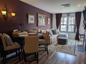 a living room with a couch and a table at Mt. Slope Great View 1 Bed Condo in Vernon Township