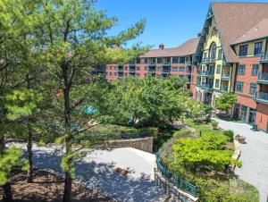 an aerial view of a resort with trees and buildings at Great Views 2 Bed 2 Bath Updated in Vernon Township