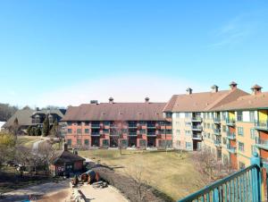 a group of apartment buildings in a city at 2 Bed Top Flr Prem Penthouse Suite in Vernon Township