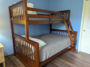 a bunk bed in a room with a bunk bedscribed at Spacious 3 bed 2 bath Sanctuary in Vernon Township +35 photos