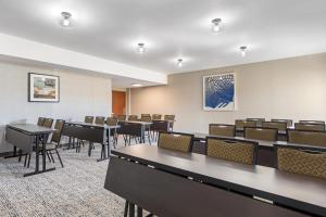 a conference room with tables and chairs in it at Best Western Plus Fresno Airport Hotel in Fresno +40 photos