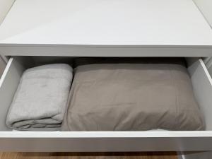 En eller flere senge i et værelse på Flat NL + 11 billeder