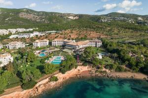 an aerial view of a resort on the beach at The St. Regis Mardavall Mallorca Resort in Portals Nous