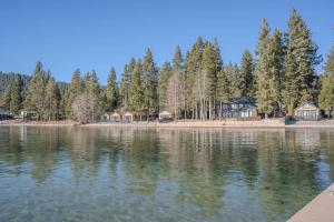 a view of a lake with houses and trees at Bearfoot Bungalow in Tahoe Vista