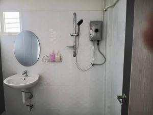 a bathroom with a shower and a sink and a mirror at Betong Chill House in Ban Hua Phrong +16 photos