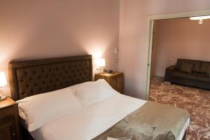 Postel nebo postele na pokoji v ubytování Palazzo Dei Mercanti - Dimora & Spa