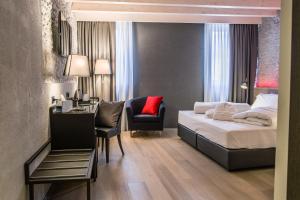 Posteľ alebo postele v izbe v ubytovaní Locanda al Vescovo & SPA