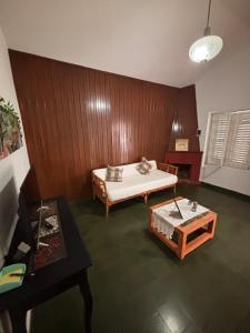 a room with a bed and a table in it at Casa céntrica en JesusMaria in Jesús María