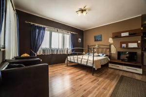 Postel nebo postele na pokoji v ubytování Villa Lugano