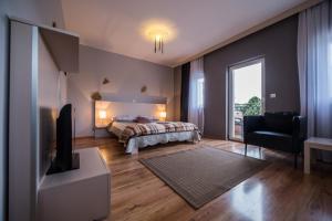 Postel nebo postele na pokoji v ubytování Villa Lugano