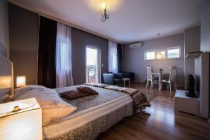 Postel nebo postele na pokoji v ubytování Villa Lugano