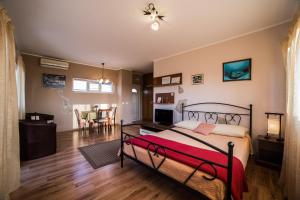 Postel nebo postele na pokoji v ubytování Villa Lugano