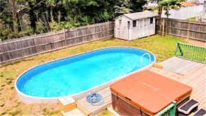 an overhead view of a swimming pool in a yard at 505 Sandalwood Road in Wildwood Highlands Beach
