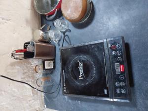 a close up of a device on a table at Alumpara House - Home Stay in Palakkad