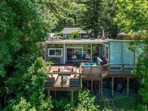 an aerial view of a house with a deck at River View Lodge - Hot Tub And Tastings Included in Healdsburg