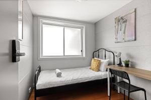 a small room with a bed and a desk at Light & Simple Single Room - Peakhurst Area - Shared Bathroom in Peakhurst