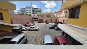 a group of cars parked in a parking lot at Hotel la Ermita in Las Victorias