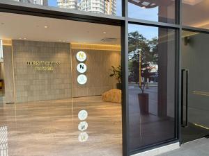 a glass door of a museum tokyo tower at The Aerie in Kuala Lumpur