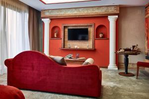 TV a/nebo společenská místnost v ubytování Hotel del Sole