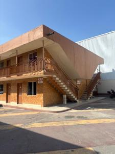 a building with stairs on the side of it at Hotel Vagabundo in Tijuana