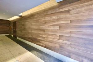 a stone wall in a lobby with at Kyo-wa Hotel Oshiage in Tokyo