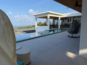 a view from the roof of a house with a patio at Luxurious Villa with Private Indoor Pool in Bophut