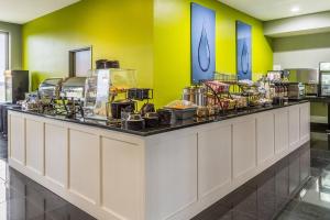 a buffet line with food on top of it at The Wallhouse Hotel, an Ascend Collection Hotel in Walnut Creek