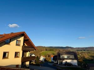 a view of a house and a house at Rauschelbach Loft 9 in Poppenhausen
