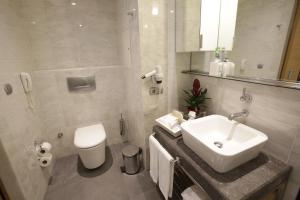 Koupelna v ubytování Housez Suites & Apartments Special Class
