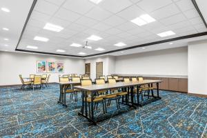 a conference room with tables and chairs in it at Hampton Inn & Suites Claremore in Claremore +48 photos
