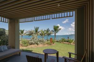 a living room with a view of the ocean at Park Hyatt St. Kitts in Christophe Harbour