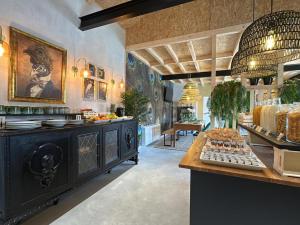 a kitchen with a counter with food on it at Castaños - Casal do Conde in Caldas de Reis