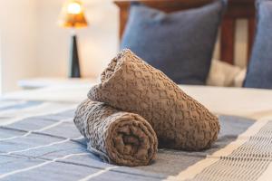 a brown towel on top of a table at The Sands Cottage in Cape Town +18 photos