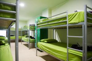 a group of bunk beds in a room at Alberg Naturland in Sant Julià de Lòria
