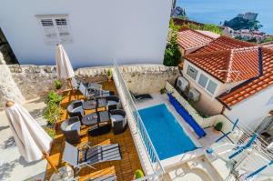 an aerial view of a house with a swimming pool at Apartments Villa Ankora in Dubrovnik
