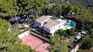 an aerial view of a house with a pool at La Casa Delviga in Olivella