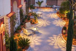 an overhead view of a patio with tables and chairs at Hotel Royalmar in Cagnes-sur-Mer