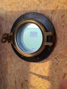 a view through a window on an airplane at De Maanloper in Bant