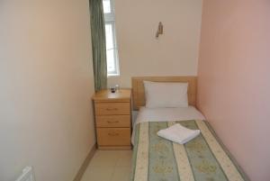 Postel nebo postele na pokoji v ubytování European Hotel