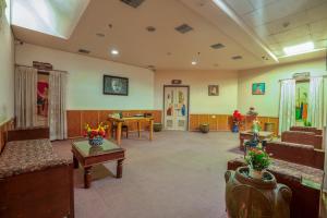 a large living room with couches and a table at Marugarh Resort and Spa in Jodhpur