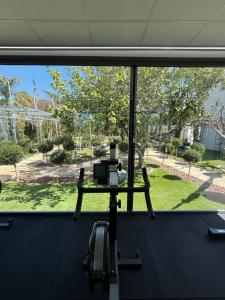 a camera sitting on a table in front of a window at Oasis By The Sea - Cyprus in Larnaca