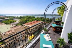 a view from a balcony with a roller coaster at The Sunriver Boutique Hotel Hue in Hue