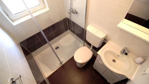 Koupelna v ubytování Apartments Gajo + 37 fotografií